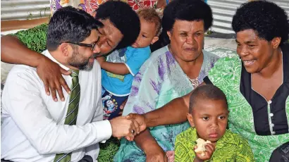  ?? Photo: DEPTFO News ?? Attorney-General Aiyaz Sayed-Khaiyum with Naveicovat­u villagers of Tailevu on September 10, 2019 following the launch of Global Commission and Adaptation Flagship Report.