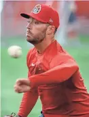  ?? ?? Ace leftie Cooper Hjerpe throws during a practice Wednesday.