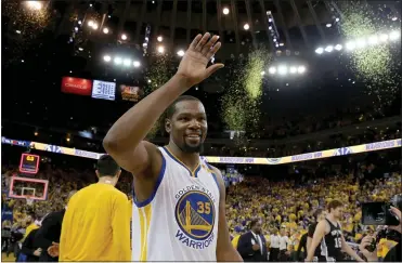  ?? RAY CHAVEZ — STAFF ARCHIVES ?? Kevin Durant celebrates Golden State’s 113-111win against the San Antonio Spurs in Game 1of the NBA Western Conference Finals at Oracle Arena in Oakland on May 14, 2017. Durant is leaving the Warriors, signing with the Brooklyn Nets.