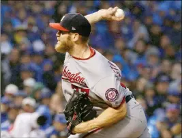  ?? ASSOCIATED PRESS ?? WASHINGTON NATIONALS STARTING PITCHER STEPHEN STRASBURG throws during the seventh inning in Game 4 of the National League Division Series against the Chicago Cubs on Wednesday in Chicago.