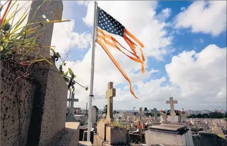  ?? Photograph­s by Carolyn Cole Los Angeles Times ?? PUERTO RICO officially raised the death toll from the two hurricanes last year from about 17 to 2,975, a tally fixed by researcher­s.