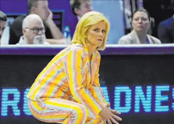  ?? Gerald Herbert The Associated Press ?? Louisiana State women’s coach Kim Mulkey believes the ability to adapt to changing rules and times is the key to successful coaching.