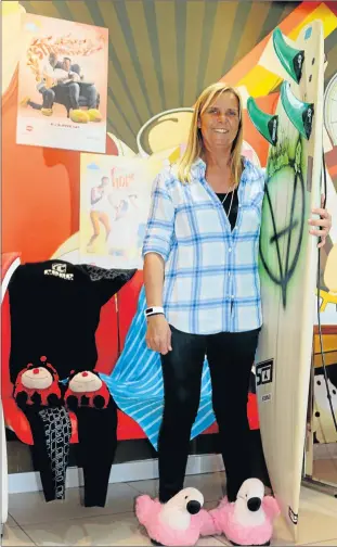  ?? Picture: SUPPLIED ?? FOR A FITTING CAUSE: Wendy Botha, East London-born, four-time world surfing champion, wearing her slippers in support of the Reach for a Dream Slipper Day which takes place on Friday