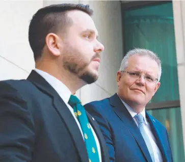  ?? Picture: GARY RAMAGE ?? NOT DELIVERING: Prime Minister Scott Morrison and Herbert MP Phillip Thompson.