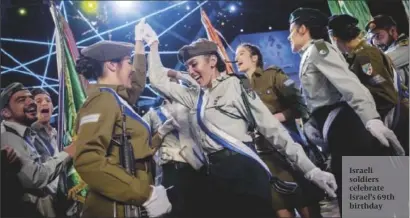  ?? PHOTO: FLASH90 ?? Israeli soldiers celebrate Israel’s 69th birthday