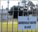  ?? Picture: BRIAN WITBOOI ?? SAVING FACILITIES: A sign advises of borehole water being used on Grey Junior School’s cricket field