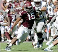  ?? AP/SAM CRAFT ?? Defensive end Myles Garrett (15) leads the country with 51/2 sacks for No. 14 Texas A&M, which also leads the nation with 15 sacks heading into Saturday’s SEC opener against Arkansas.