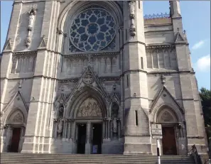  ??  ?? Man sleeps on steps of St Peter’s Church