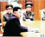  ?? Ahn Young-joon / Associated Press ?? North Korean leader Kim Jong Un on Friday declared his frontline troops in a “quasi-state of war” and ordered them to prepare for battle a day after a confrontat­ion with South Korea.