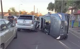  ?? COURTESY TEMPE POLICE DEPARTMENT ?? Uber has halted its self-driving car program following a crash involving one of the vehicles in Tempe on Friday. The test program had been operating in Arizona since late December.