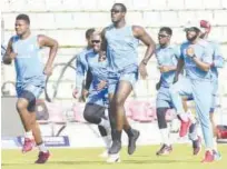  ?? Agence France-presse ?? West Indies’ Shai Hope (right) jogs with his team-mates during a practice session ahead of their third ODI match against Bangladesh in Sylhet.