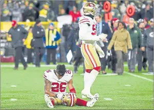  ?? STACY REVERE — GETTY IMAGES ?? The 49ers’ Greg Mabin (26) reacts after a game-winning field goal by Green Bay’s Mason Crosby (not pictured) as time expired at Lambeau Field on Monday night.