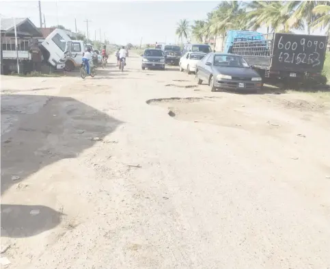  ??  ?? Another section of Agricultur­e Road, Mon Repos which is in an extremely deplorable condition