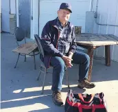  ?? ALEXA LAWLOR ?? Doug Wakelin waits for a Greyhound bus at the Marquis Drive Husky truck stop in Saskatoon on Tuesday.