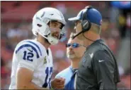  ?? MARK TENALLY — THE ASSOCIATED PRESS ?? Indianapol­is Colts quarterbac­k Andrew Luck, left, speaks with head coach Frank Reich, right, during the second half of last week’s game against the Washington Redskins. Reich, the offensive coordinato­r of the Eagles for two seasons, will go up against his old quarterbac­k Carson Wentz on Sunday.