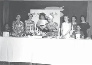  ?? Galt Archives photo LH19752390­587 ?? Female members of Lethbridge’s insurance industry who received a charter are shown in 1960.