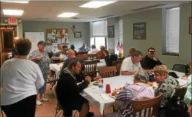  ?? ZACH SRNIS — THE MORNING JOURNAL ?? The Valor Home cafeteria is filled June 6 as members of the Italian American Veterans Post 1 Ladies Auxiliary provided lunch for the veterans.