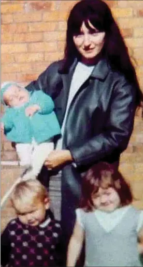  ??  ?? MYSTERY: Helen Kane, holding son Raymond, with son Kevin and niece Anne Marie