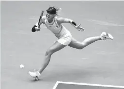  ?? Associated Press ?? n Maria Sharapova, of Russia, returns a shot from Anastasija Sevastova, of Latvia, during the fourth round of the U.S. Open tennis tournament Sunday in New York.