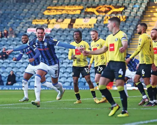  ?? Phil Oldham/rex/shuttersto­ck ?? ●●James Ball celebrates Dale’s early goal against Harrogate Town – it was to prove a false dawn