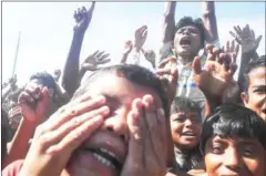  ?? AFP ?? Rohingya refugees protest against a disputed repatriati­on programme at the Unchiprang refugee camp near Teknaf on November 15.