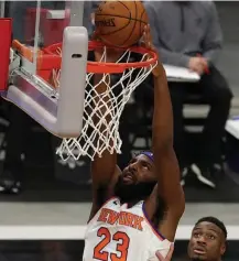  ?? / GETTY IMaGES ?? TOUGH LOSS: The Knicks beat the Bucks, but lost starting center Mitchell Robinson to a broken foot.