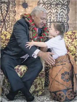  ?? Picture / Greg Bowker ?? Frank Bainimaram­a greets Maraia Kauyaki during a visit to Bula Kindergart­en in Mangere yesterday.