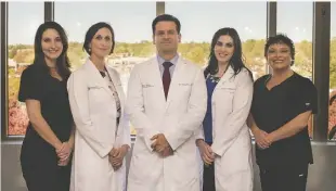  ?? COURTESY PHOTO ?? Dr. Juan Carlos Caballero and his team at Warrenton Dermatolog­y.