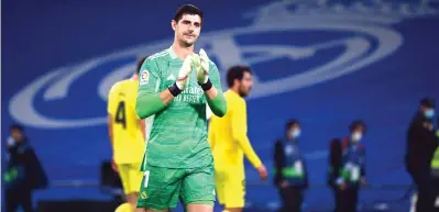  ?? — AFP photo ?? Real Madrid’s Belgian goalkeeper Thibaut Courtois applauds at the end of the Spanish League football match between Real Madrid and Villarreal CF at the Santiago Bernabeu stadium in Madrid.