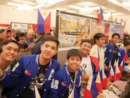  ??  ?? FLY EAGLE FLY The Ateneans charmed all who visited the Ateneo/Philippine­s booth at the Cultural Fair held in the ballroom of Omni Hotel