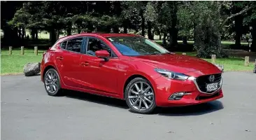  ??  ?? Top-specificat­ion Mazda3 Limited is nudging $50,000. But we reckon the price is justified.