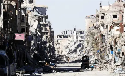  ??  ?? Rebuilding Raqqa, which resembles wrecked Syrian cities like Aleppo and Homs, is likely to take years. (Reuters)