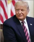  ?? ANDREW HARNIK - THE AP ?? President Donald Trump listens during an event called “Kids First: Getting America’s Children Safely Back to School” in the State Dining room of the White House, Wednesday, Aug. 12, in Washington.