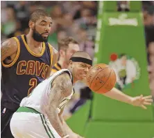  ?? STAFF FILE PHOTO BY STUART CAHILL ?? FINALLY DONE: The blockbuste­r trade that sends Isaiah Thomas to the Cavaliers and brings Kyrie Irving to the Celtics officially was completed by the teams last night.