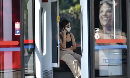  ?? Photograph: Martin Meissner/AP ?? A passenger wears a face mask on a tram in Gelsenkirc­hen, Germany.