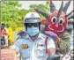  ??  ?? Traffic police personnel take part in a bike rally to spread awareness on Covid-19 coronaviru­s, in Chennai on Thursday.