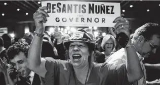  ?? Scott McIntyre / New York Times ?? Supporters of Ron DeSantis, Republican candidate for Florida governor, celebrate his victory on election night. Nationwide results indicate that while “the Resistance” is good at generating lots of votes, it hasn’t figured out how to turn the votes into seats.