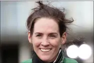  ?? SCOTT HEPPELL - THE ASSOCIATED PRESS ?? Rachael Blackmore talks to journalist­s after winning the Randox Grand National Handicap Chase ridding Minella Times on the third day of the Grand National Horse Racing meeting at Aintree racecourse, near Liverpool, England, Saturday April 10, 2021.