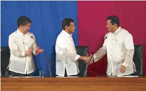  ?? Photo by KRIZ JOHN ROSALES ?? For the first time in history, the President, Senate President and Speaker of the House are all from Mindanao. In photo are Senate President Aquilino Pimentel III (left) and Speaker Pantaleon Alvarez during President Duterte’s first State of the Nation...