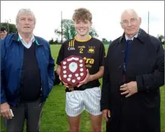  ??  ?? Adamstown captain Tom Roche with Des Croke (Children’s Officer) and Brendan Furlong (People Newspapers).