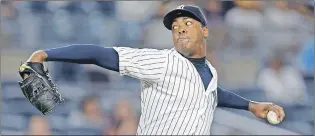  ?? AP PHOTO ?? The Chicago Cubs sent four players, including one of their best prospects, to the New York Yankees in exchange for fireballin­g relief pitcher Aroldis Chapman, shown in an American League game against the Boston Red Sox earlier this month.