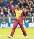  ?? LINDSEY PARNABY/AFP ?? West Indies captain Carlos Brathwaite celebrates taking a wicket during the T20 Internatio­nal cricket against England at The Emirates Riverside, Chester-leStreet in northeast England, on Saturday.