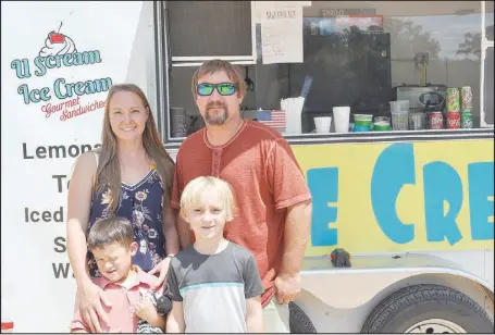  ?? RACHEL DICKERSON/ MCDONALD COUNTY PRESS ?? Owners Ashley and Adam Murphy (back row, left), along with sons Corbin (left), 5, and Zander, 7, are pictured at the U Scream Ice Cream food truck.