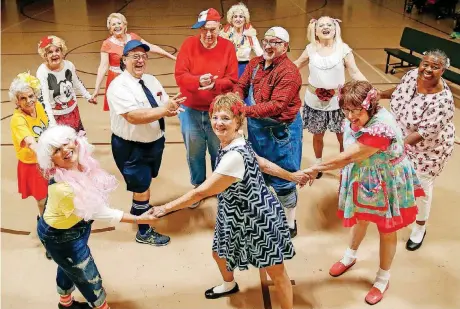  ?? [PHOTOS BY NATE BILLINGS, THE OKLAHOMAN] ?? Members of the Oklahoma Seniors Cabaret pose for a photo during rehearsal at Messiah Lutheran Church on Monday in Oklahoma City.