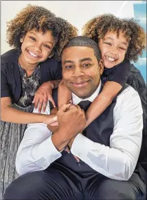  ?? RON BATZDORFF / NBC ?? Next summer Kenan Thompson will shoot the NBC single-camera comedy “The Kenan Show,” which he will executive produce and star in as a widowed father of two daughters, played by Dani Lockett (left) and Dannah Lockett.