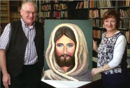  ??  ?? Kanturk Artist Noreen Twohig presenting her specially commission­ed Painting of Jesus to Fr. Eugene at St. Francis’ Church in Cork. The Painting will be placed on the left side of the Entrance Porch in the main Church.