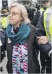  ??  ?? Federal Green Party Leader Elizabeth May is arrested by RCMP after joining protesters outside Kinder Morgan’s Trans Mountain facility in Burnaby on March 23.
