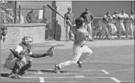  ?? Tim Godbee, File ?? Calhoun senior Julian Ipac delivers the game-winning hit to give Calhoun Baseball head coach Chip Henderson his 600th career win. The Yellow Jackets beat Fannin County 2-1 on Feb. 29.