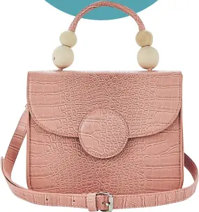  ??  ?? …new arm candy. Don’t you just love the wooden bead detailing on this baby pink handbag?
£25, very.co.uk