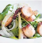  ??  ?? Octopus salad comes with arugula, cherry tomatoes, lemon vinaigrett­e and fennel.